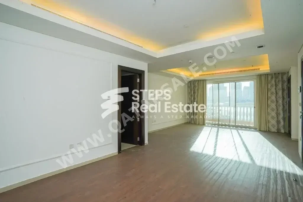 2 Bedrooms  Apartment  For Rent  in Doha -  The Pearl  Semi Furnished