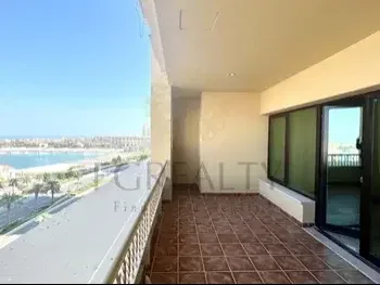 2 Bedrooms  Apartment  For Rent  in Doha -  The Pearl  Fully Furnished