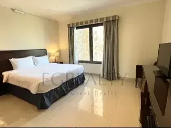 2 Bedrooms  Apartment  For Rent  in Doha -  The Pearl  Fully Furnished