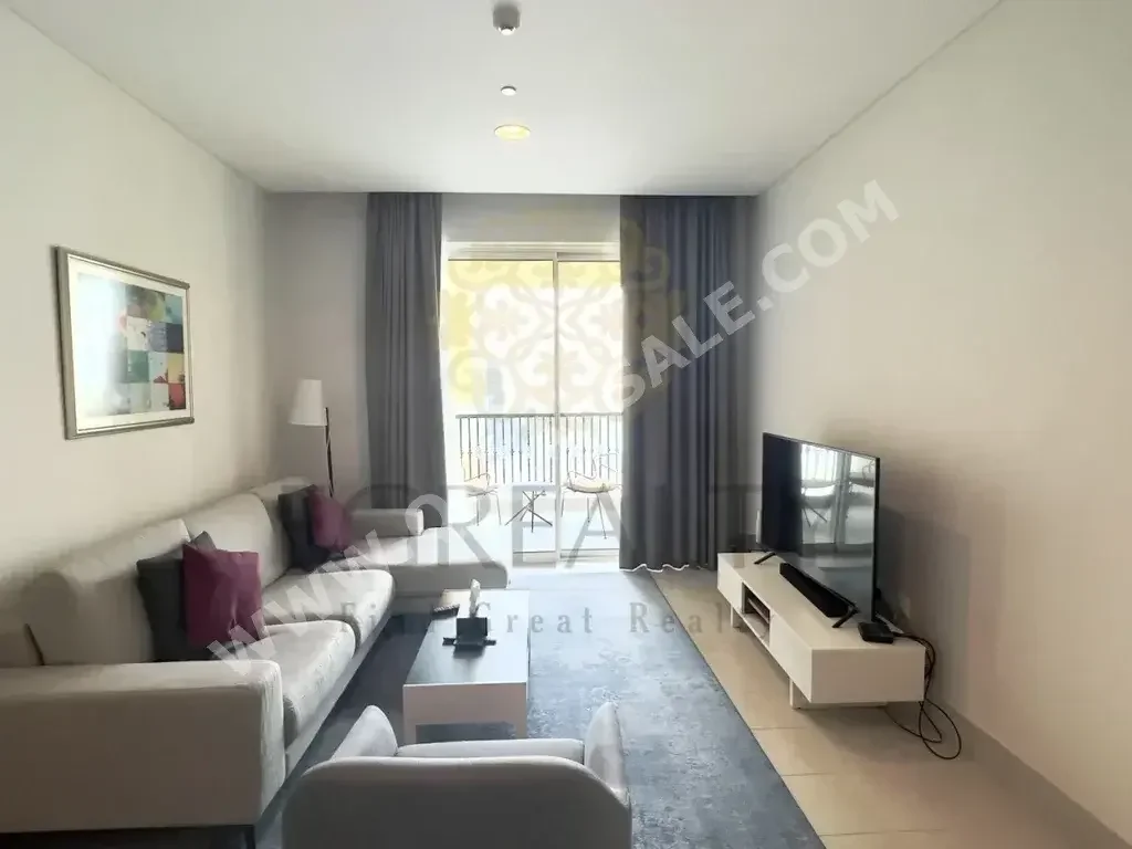 2 Bedrooms  Apartment  For Rent  in Doha -  The Pearl  Fully Furnished