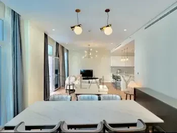 2 Bedrooms  Apartment  For Rent  in Doha -  The Pearl  Fully Furnished