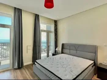 2 Bedrooms  Apartment  For Rent  in Doha -  The Pearl  Fully Furnished