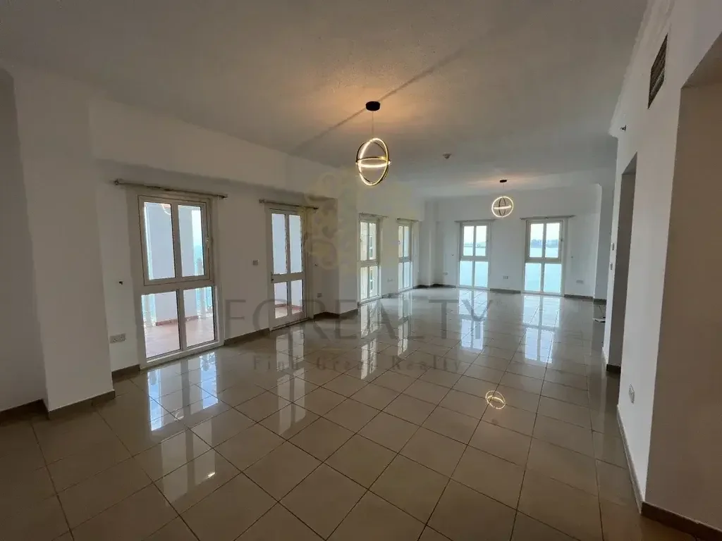 4 Bedrooms  Apartment  For Rent  in Doha -  West Bay  Not Furnished