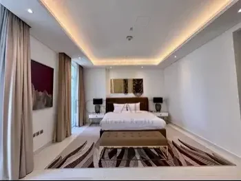 3 Bedrooms  Apartment  For Rent  in Doha -  The Pearl  Fully Furnished