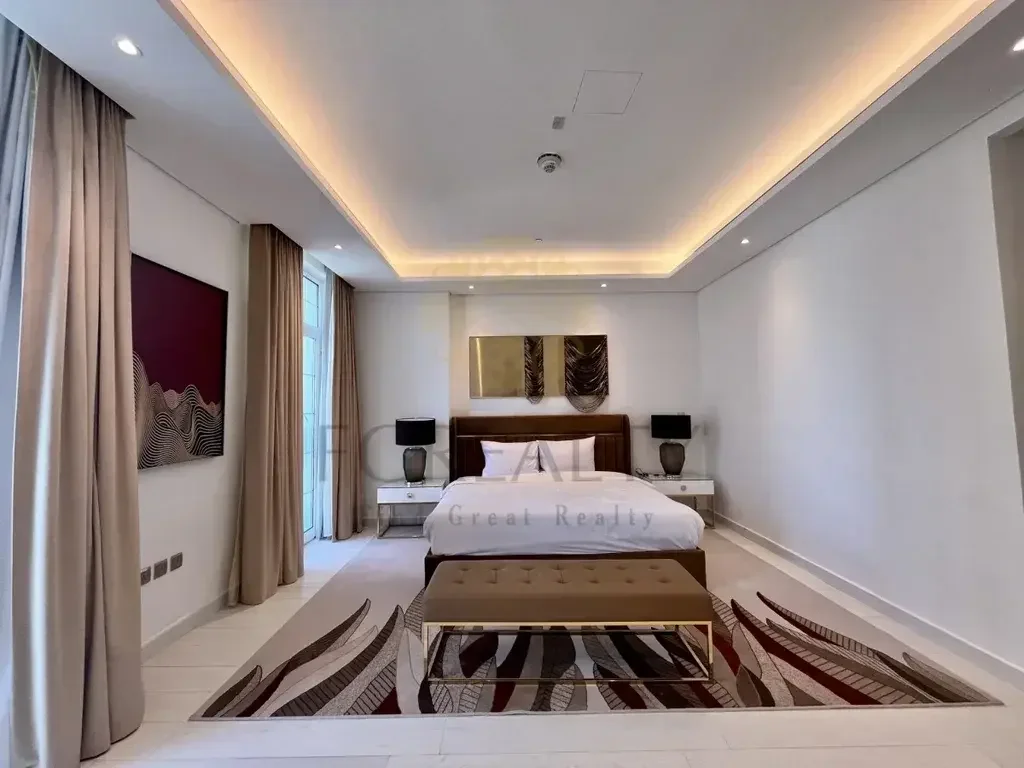 3 Bedrooms  Apartment  For Rent  in Doha -  The Pearl  Fully Furnished