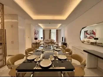 2 Bedrooms  Apartment  For Rent  in Doha -  The Pearl  Fully Furnished