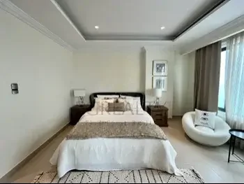 2 Bedrooms  Apartment  For Rent  in Doha -  The Pearl  Fully Furnished