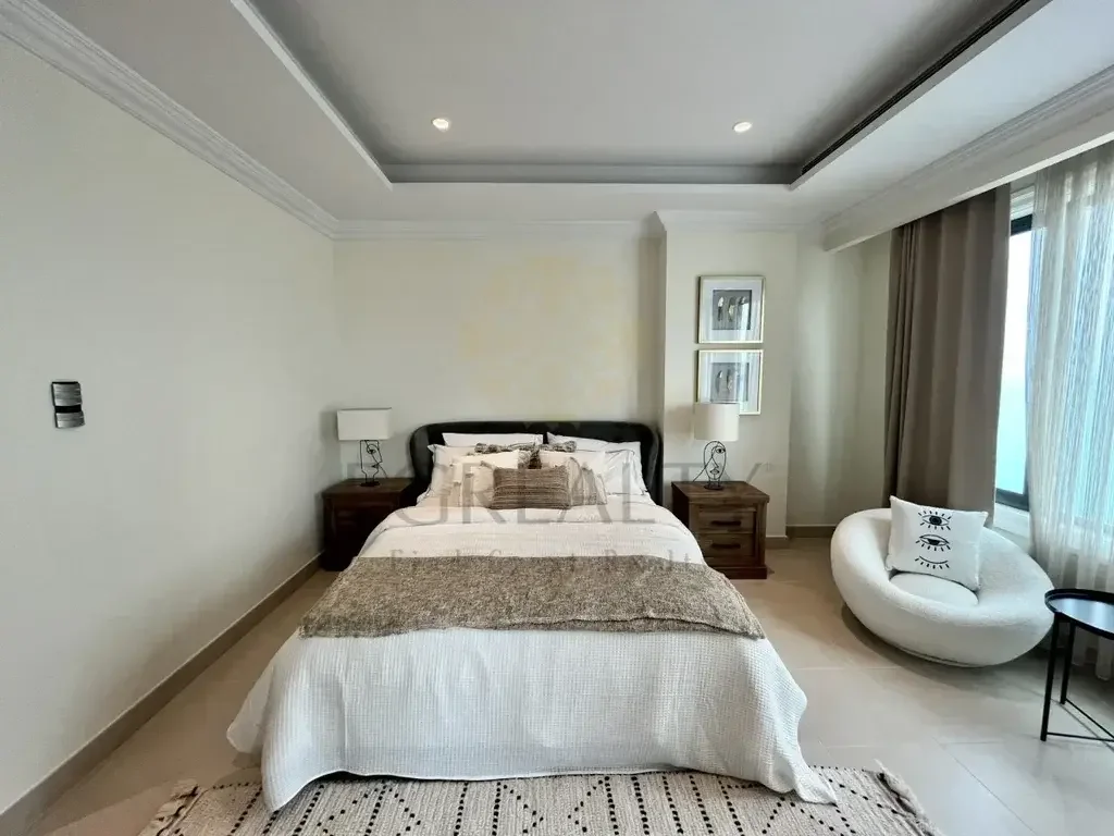 2 Bedrooms  Apartment  For Rent  in Doha -  The Pearl  Fully Furnished