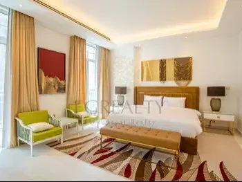 3 Bedrooms  Apartment  For Rent  in Doha -  The Pearl  Fully Furnished