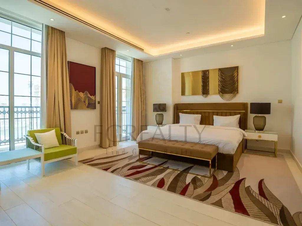 3 Bedrooms  Apartment  For Rent  in Doha -  The Pearl  Fully Furnished