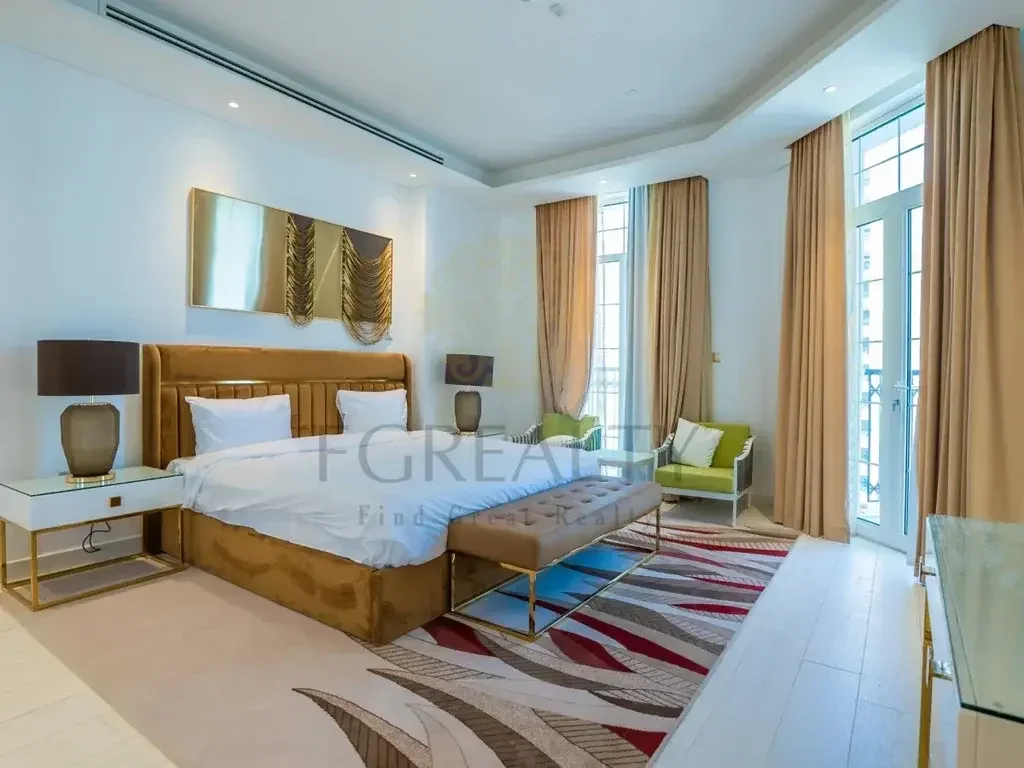 2 Bedrooms  Apartment  For Rent  in Doha -  The Pearl  Fully Furnished