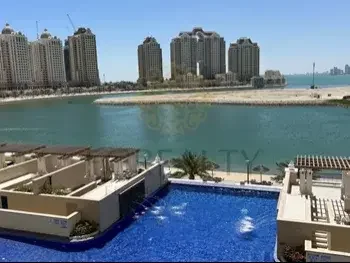 2 Bedrooms  Apartment  For Rent  in Doha -  The Pearl  Fully Furnished