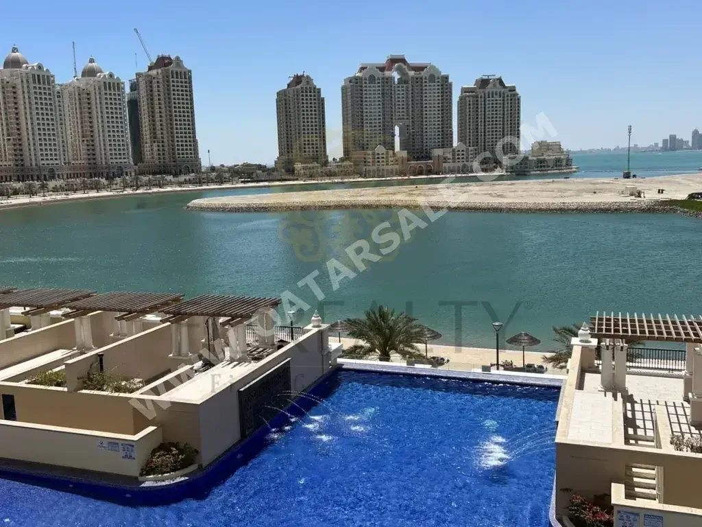 2 Bedrooms  Apartment  For Rent  in Doha -  The Pearl  Fully Furnished