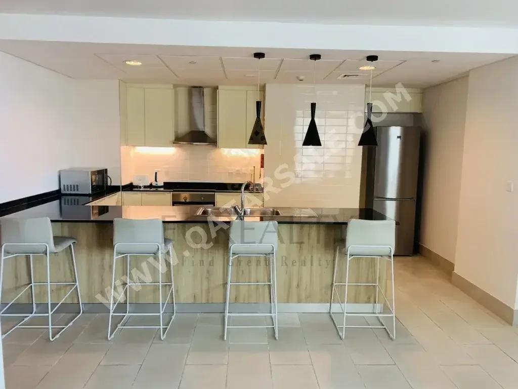 3 Bedrooms  Apartment  For Rent  in Doha -  The Pearl  Fully Furnished