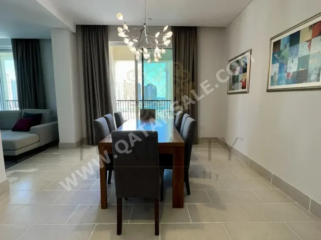 3 Bedrooms  Apartment  For Rent  in Doha -  The Pearl  Fully Furnished