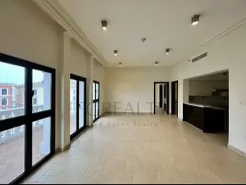 2 Bedrooms  Apartment  For Rent  in Doha -  The Pearl  Not Furnished