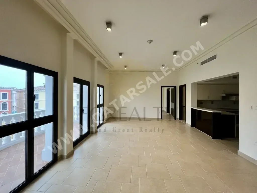 2 Bedrooms  Apartment  For Rent  in Doha -  The Pearl  Not Furnished