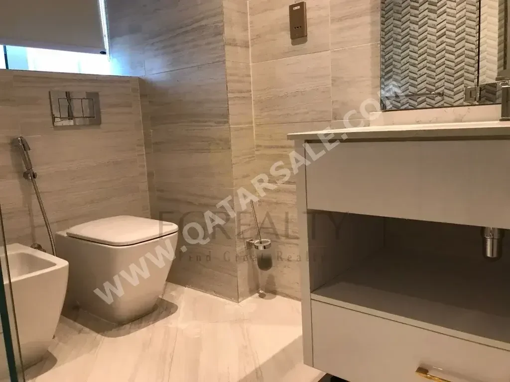 2 Bedrooms  Apartment  For Rent  in Doha -  The Pearl  Fully Furnished