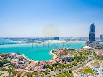 2 Bedrooms  Apartment  For Rent  in Doha -  The Pearl  Not Furnished