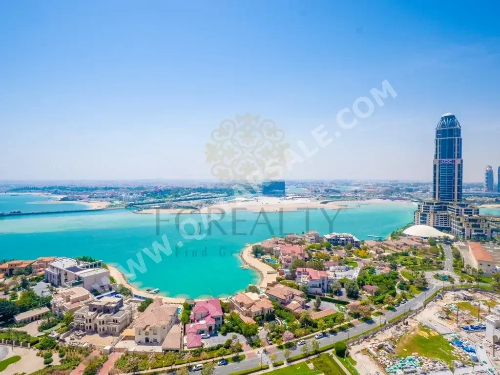 2 Bedrooms  Apartment  For Rent  in Doha -  The Pearl  Not Furnished