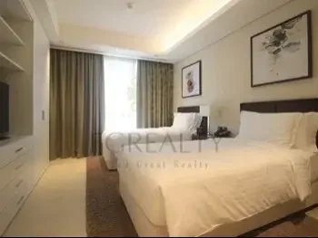 2 Bedrooms  Apartment  For Rent  in Doha -  West Bay  Fully Furnished