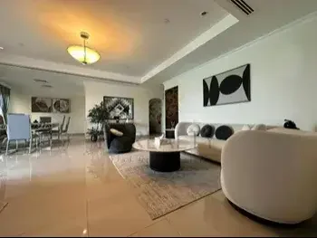 2 Bedrooms  Apartment  For Rent  in Doha -  The Pearl  Fully Furnished