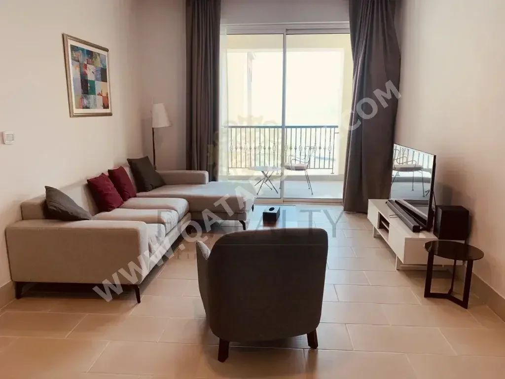 2 Bedrooms  Apartment  For Rent  in Doha -  The Pearl  Fully Furnished