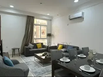 2 Bedrooms  Apartment  For Rent  in Doha -  Al Mansoura  Fully Furnished