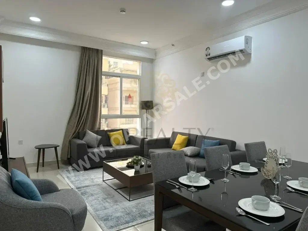 2 Bedrooms  Apartment  For Rent  in Doha -  Al Mansoura  Fully Furnished