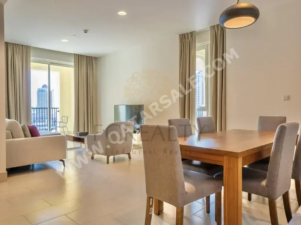 2 Bedrooms  Apartment  For Rent  in Doha -  The Pearl  Fully Furnished