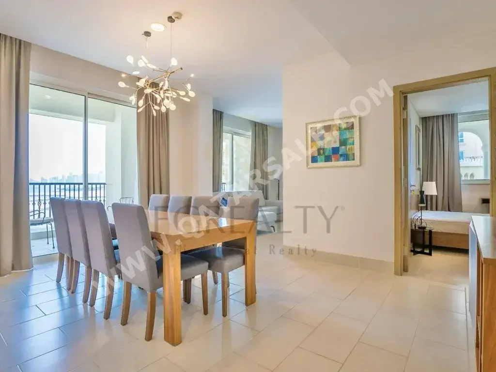 3 Bedrooms  Apartment  For Rent  in Doha -  The Pearl  Fully Furnished