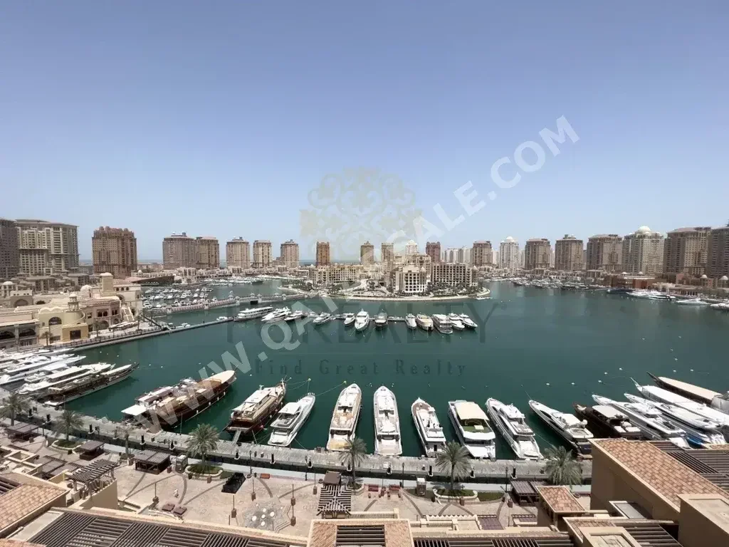 2 Bedrooms  Apartment  For Rent  in Doha -  The Pearl  Fully Furnished