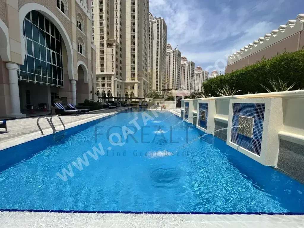 3 Bedrooms  Apartment  For Rent  in Doha -  The Pearl  Fully Furnished