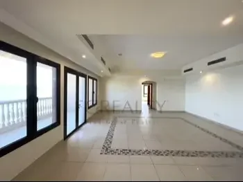 2 Bedrooms  Apartment  For Rent  in Doha -  The Pearl  Not Furnished