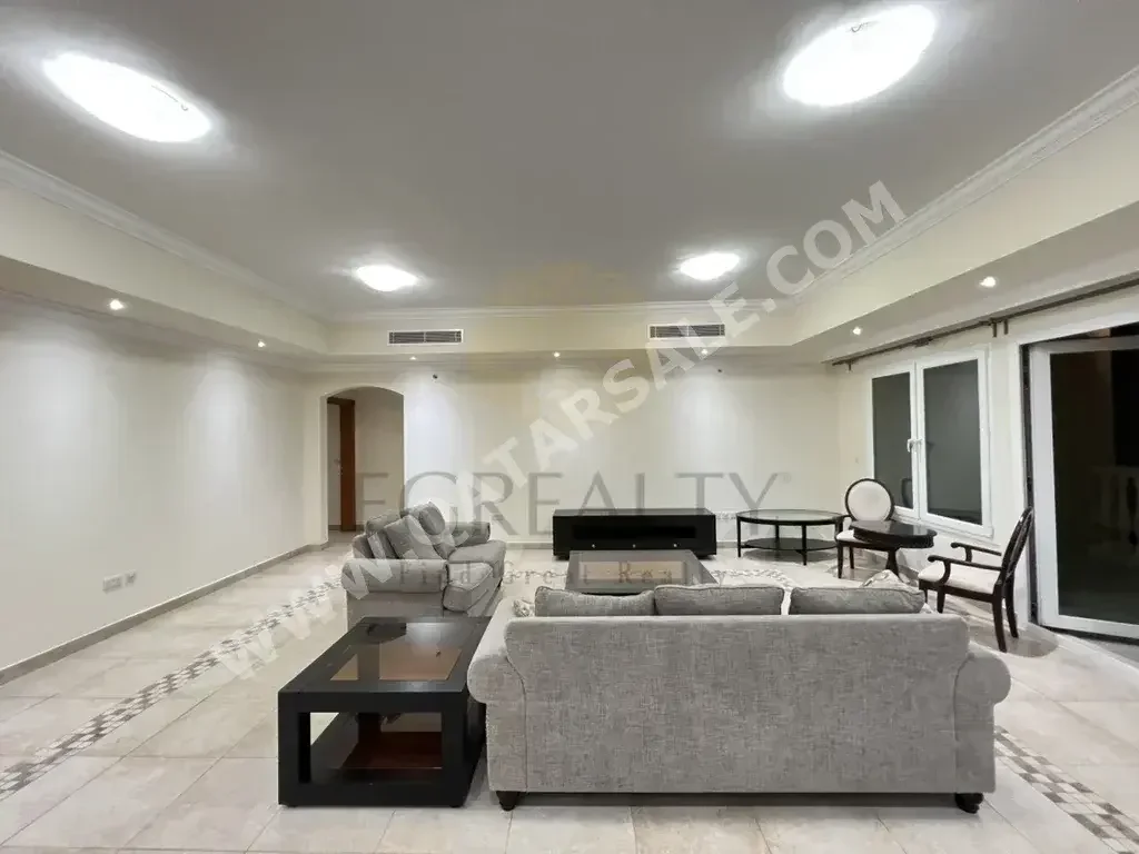 3 Bedrooms  Apartment  For Rent  in Doha -  The Pearl  Not Furnished