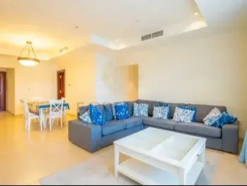 2 Bedrooms  Apartment  For Rent  in Doha -  The Pearl  Fully Furnished