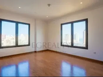 2 Bedrooms  Apartment  For Rent  in Doha -  The Pearl  Not Furnished