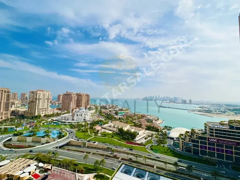 2 Bedrooms  Apartment  For Rent  in Doha -  The Pearl  Fully Furnished