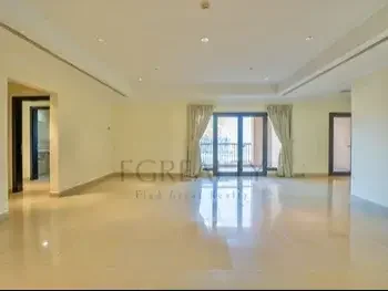 2 Bedrooms  Apartment  For Rent  in Doha -  The Pearl  Not Furnished