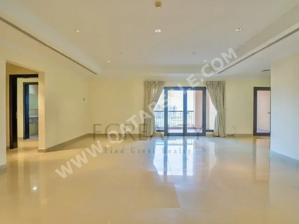 2 Bedrooms  Apartment  For Rent  in Doha -  The Pearl  Not Furnished