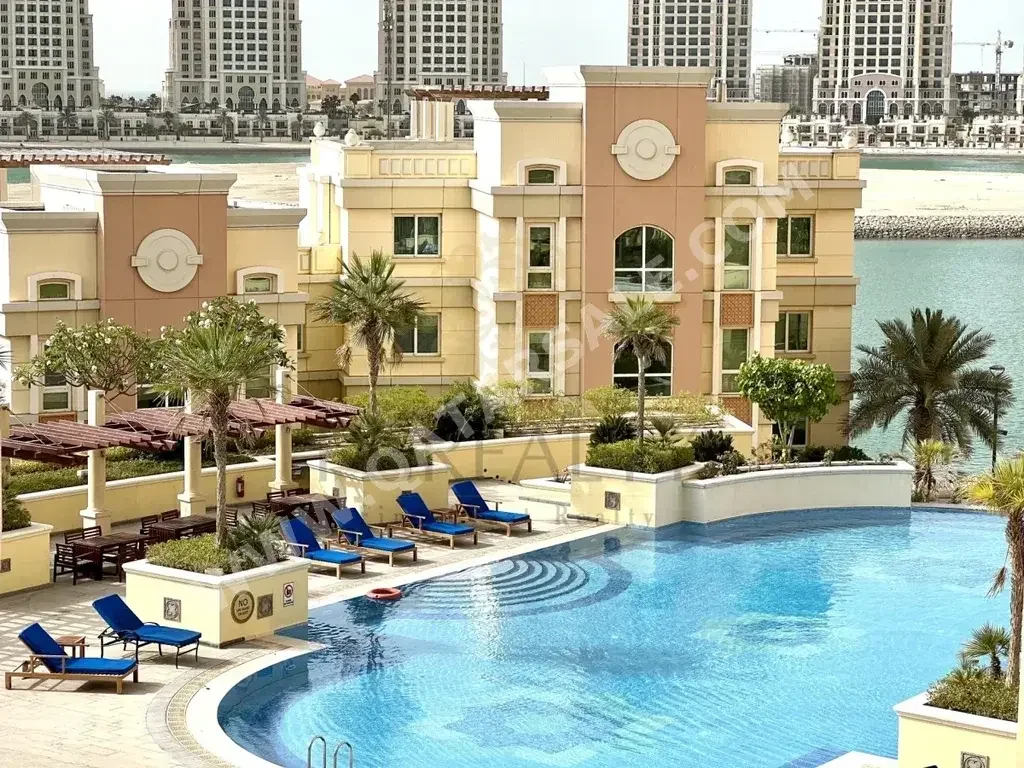 3 Bedrooms  Apartment  For Rent  in Doha -  The Pearl  Not Furnished