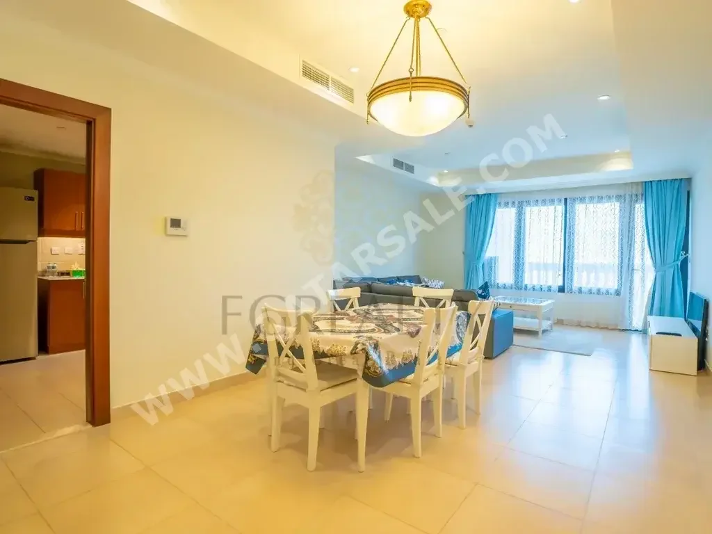 2 Bedrooms  Apartment  For Rent  in Doha -  The Pearl  Fully Furnished