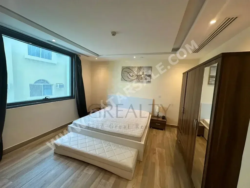 2 Bedrooms  Apartment  For Rent  in Doha -  Al Sadd  Fully Furnished