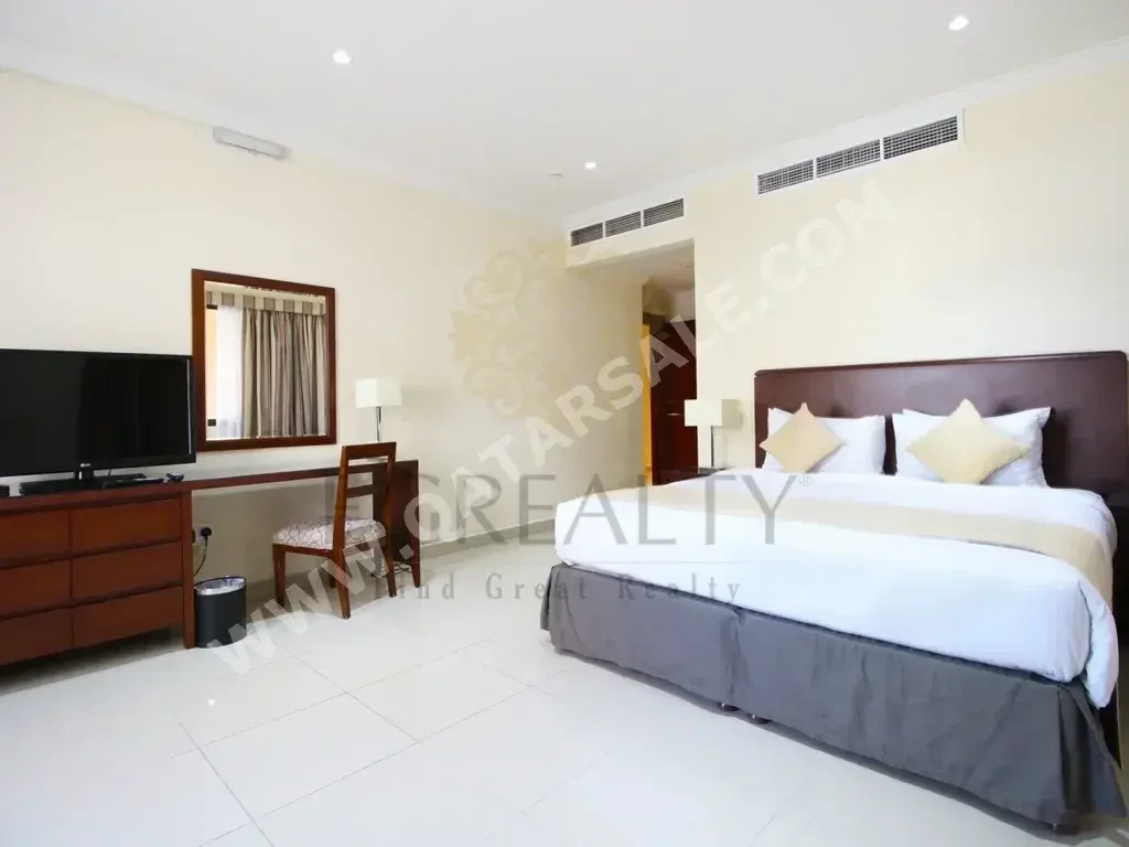 2 Bedrooms  Apartment  For Rent  in Doha -  The Pearl  Fully Furnished