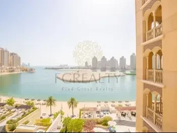 3 Bedrooms  Apartment  For Rent  in Doha -  The Pearl  Not Furnished