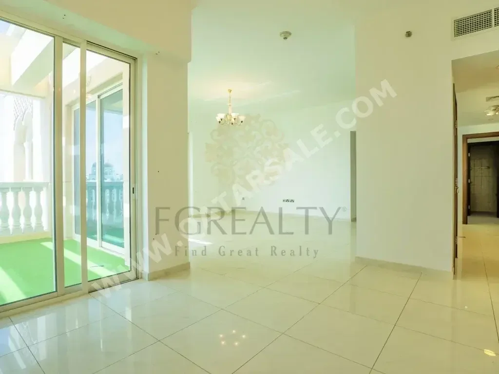 3 Bedrooms  Apartment  For Rent  in Doha -  The Pearl  Not Furnished