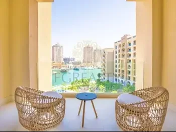 2 Bedrooms  Apartment  For Rent  in Doha -  The Pearl  Fully Furnished