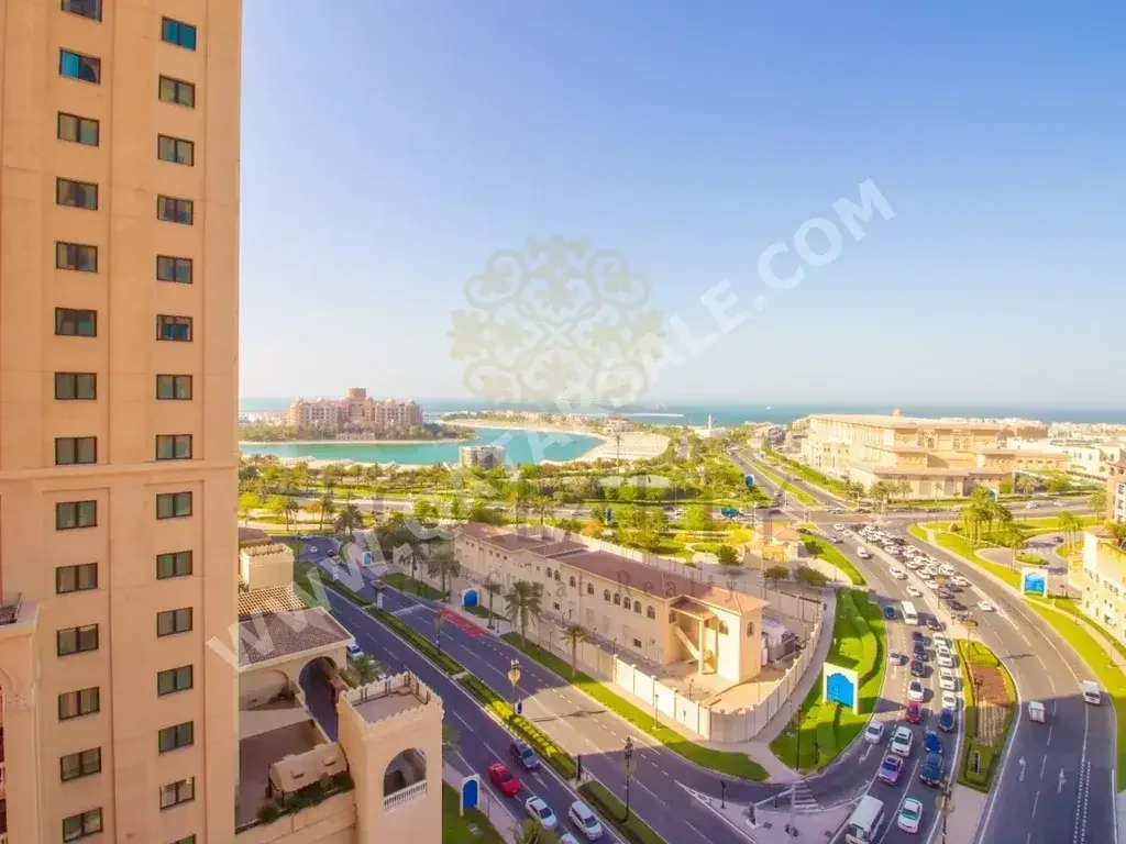 2 Bedrooms  Apartment  For Rent  in Doha -  The Pearl  Not Furnished