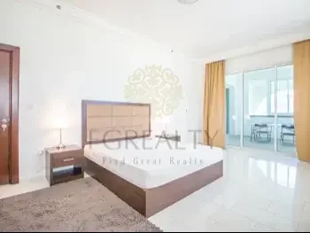 2 Bedrooms  Apartment  For Rent  in Doha -  The Pearl  Fully Furnished