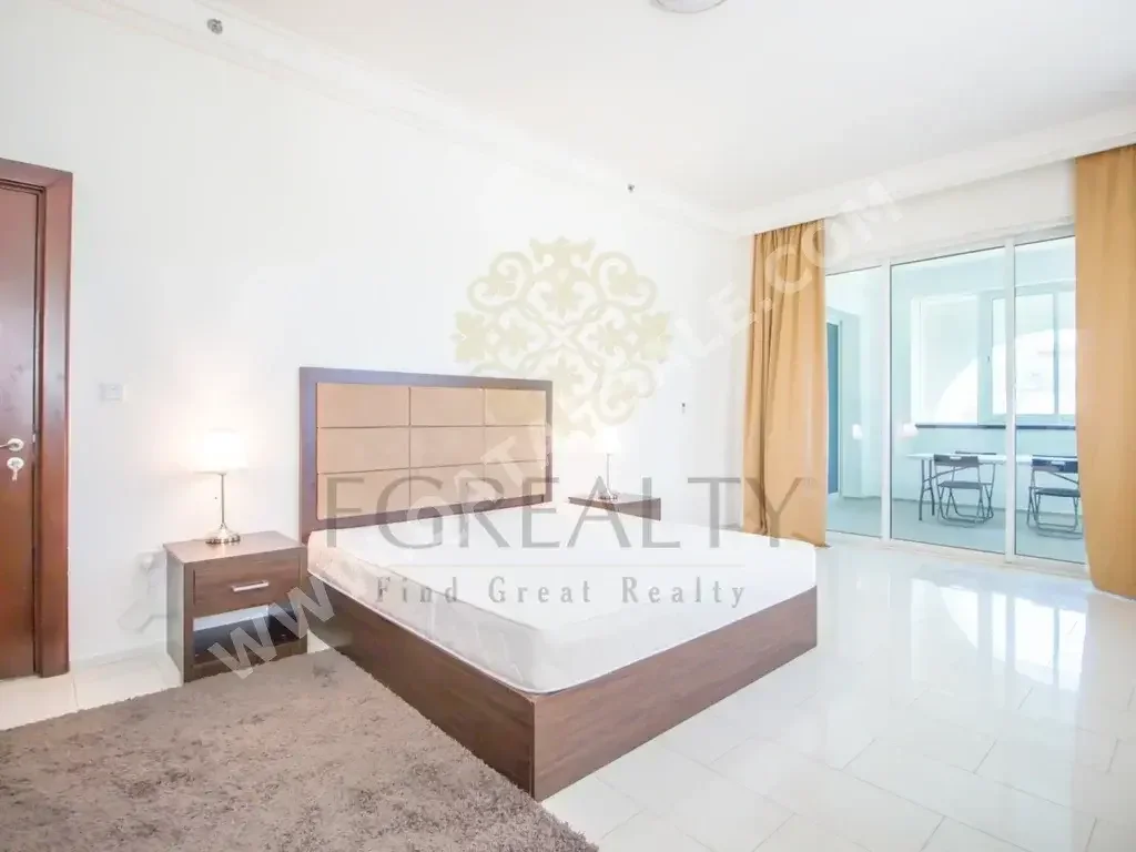 2 Bedrooms  Apartment  For Rent  in Doha -  The Pearl  Fully Furnished